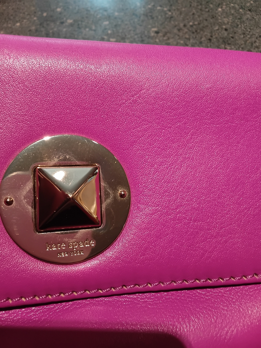 kate spade hot pink leather clutch with gold-tone stud